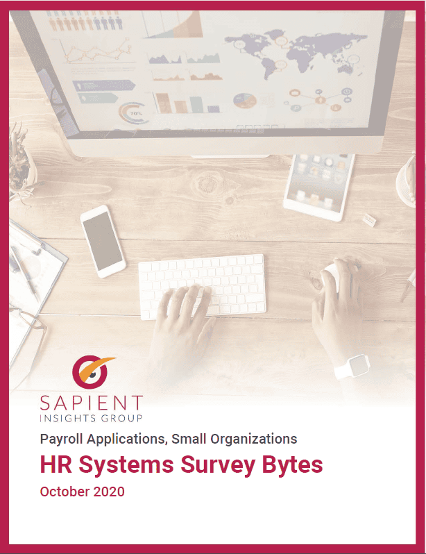 Office workspace with computer, tablet, smartphone, and data charts on screen, highlighting HR systems survey data, payroll applications, and small organization insights, for SEO-friendly image optimization.